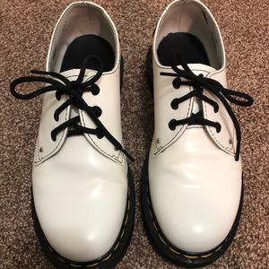 Doc Marten white Oxford shoes with black hearts on the back